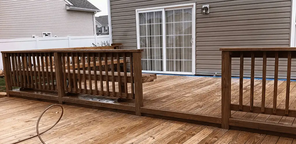 Deck sealing service protecting a backyard wood deck and railings in Stockton, CA