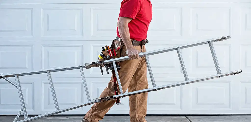 Garage door repair technician arriving with tools and ladder in Stockton, CA