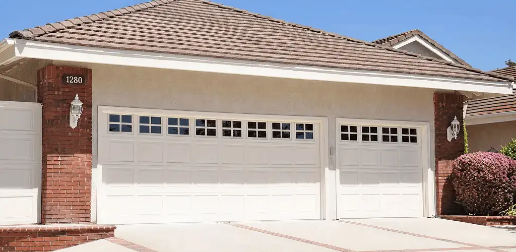 Residential garage door repair service for a double garage door in Stockton, CA