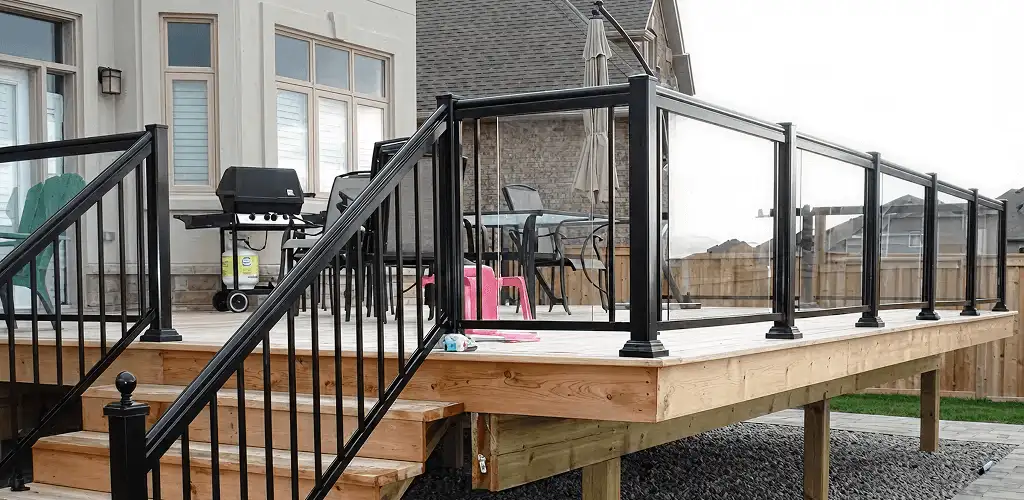 Handrail installation on a deck staircase for safety and code compliance in Stockton, CA